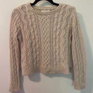Cropped cable knit sweater